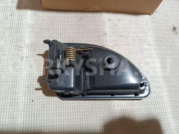 Ручка двери внутренняя правая Renault Kangoo оригинальный номер 7700309314