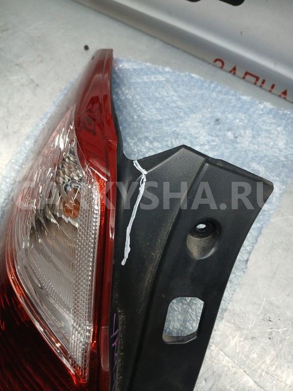 Фонарь стоп сигнала левый Subaru Exiga 