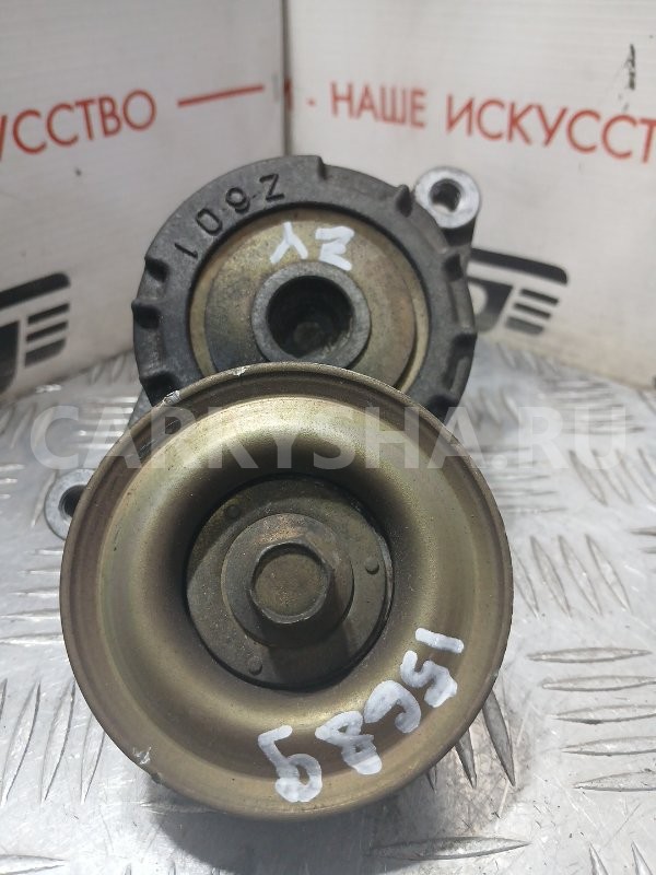 натяжитель Mazda Verisa 